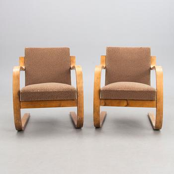 A PAIR OF 1940's ARMCHAIRS NO 34/402, Oy Huonekalu- ja Rakennustyötehdas Ab.