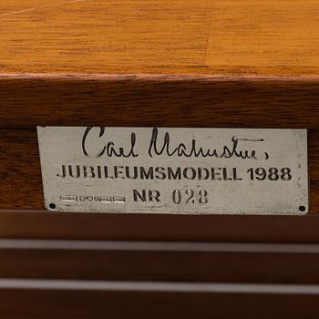 CARL MALMSTEN, a nest of three mahogany 'Släden' tables. Late 20th century.