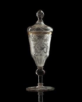 A German cut and engraved glass goblet with cover, 18th Century.