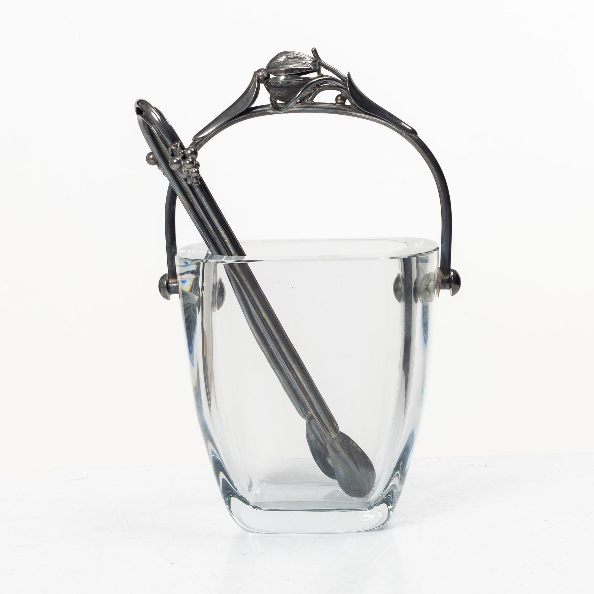 Ice bucket, glass, Strömbersghyttan, with mount and tongs in Danish silver, circa mid-20th century.
