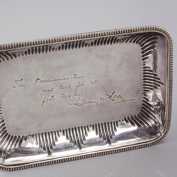 A silvered metal serving dish with rechaud, first half of the 20th century.