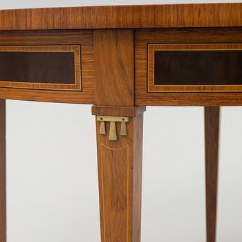 A mahogany and rosewood veneered Gustavisn style coffee table, mid 20th Century.