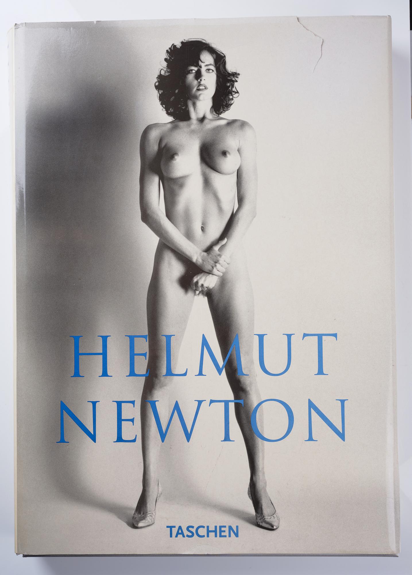 Helmut Newton, Signed book published by Taschen, Monte Carlo, 1999, ed 10000, with a metal table.