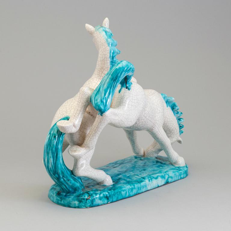 GOLDSCHEIDER, an earthenware craquelure glazed sculpture of horses, Austria.