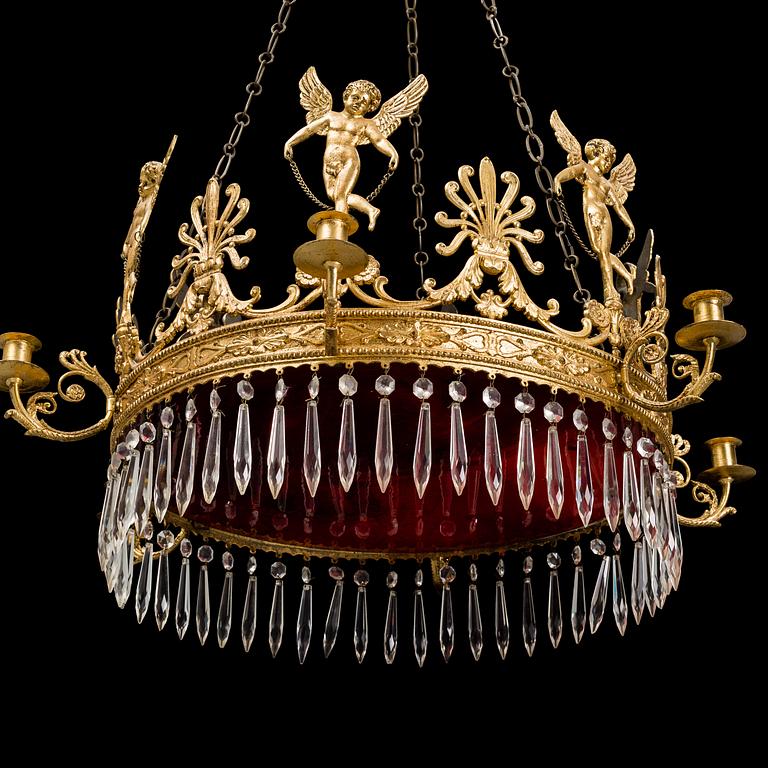 A first half of the 20th century EMpire style chandelier.