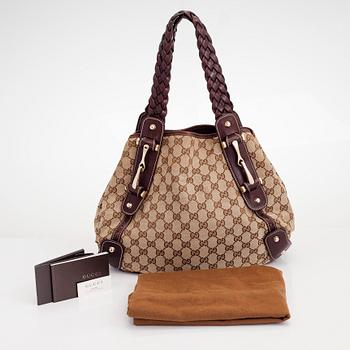 Gucci, a monogram 'Pelham' canvas and leather bag.
