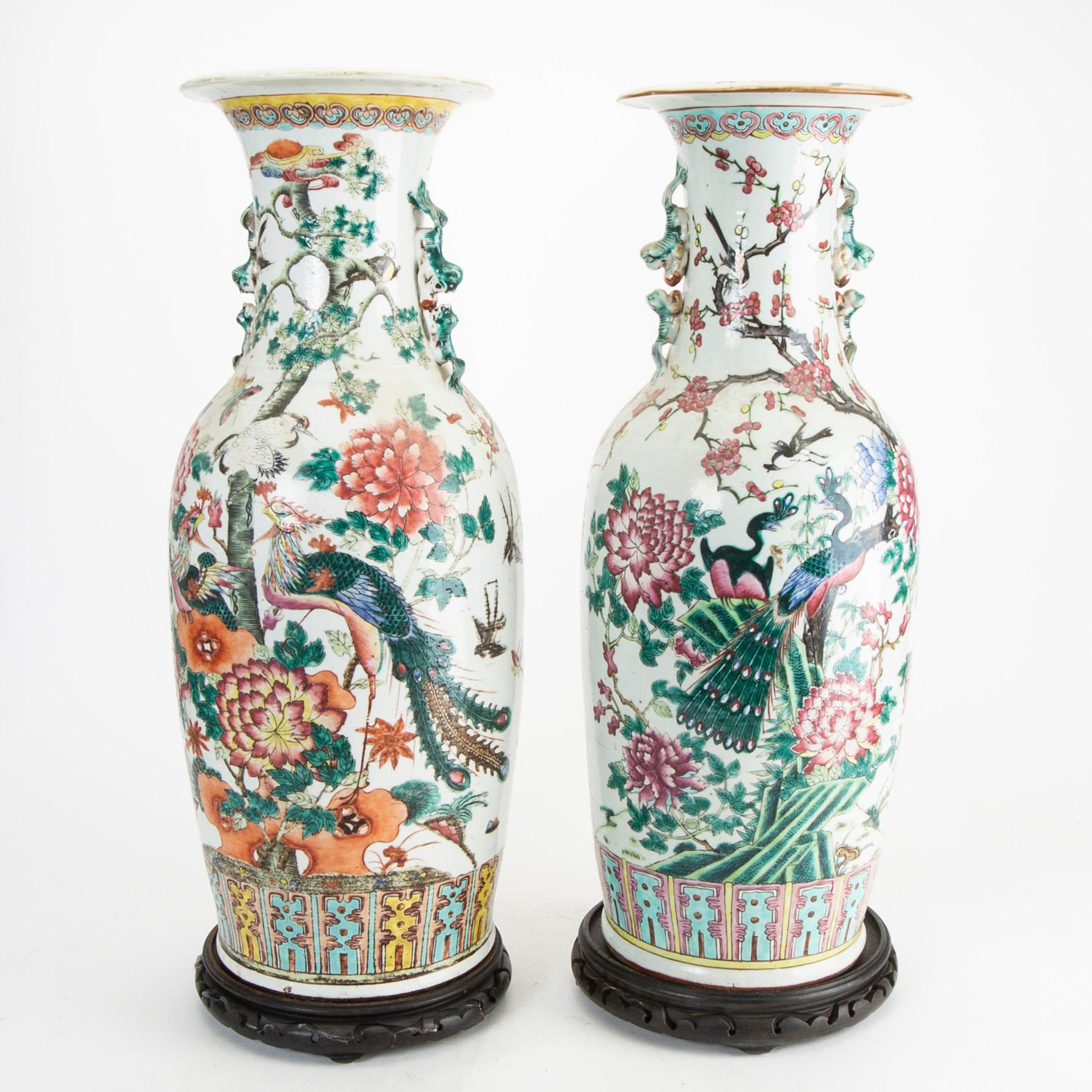 A pair of famille rose vases, late Qing dynasty, circa 1900.