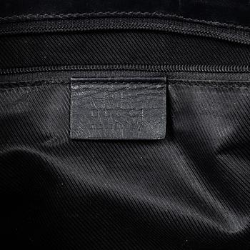 Gucci, a 'Jackie' bag.
