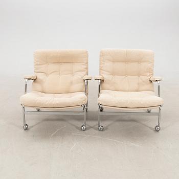 Bruno Mathsson, a pair of "Karin" armchairs for DUX, late 20th century.