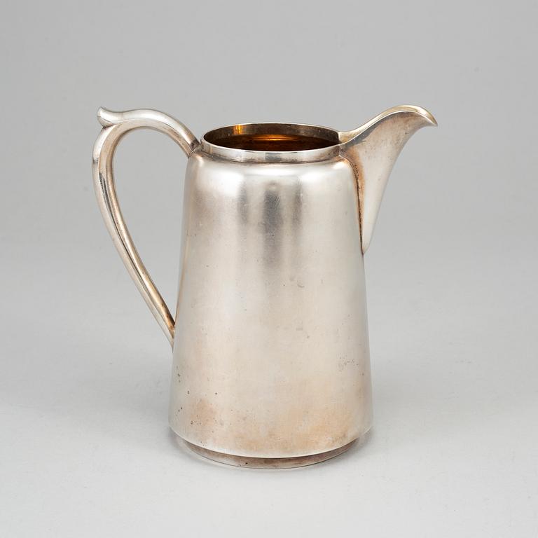 A Russian parcel-gilt silver jug, mark of Michail and Semen Grachev, St. Petersburg 1908-1917.