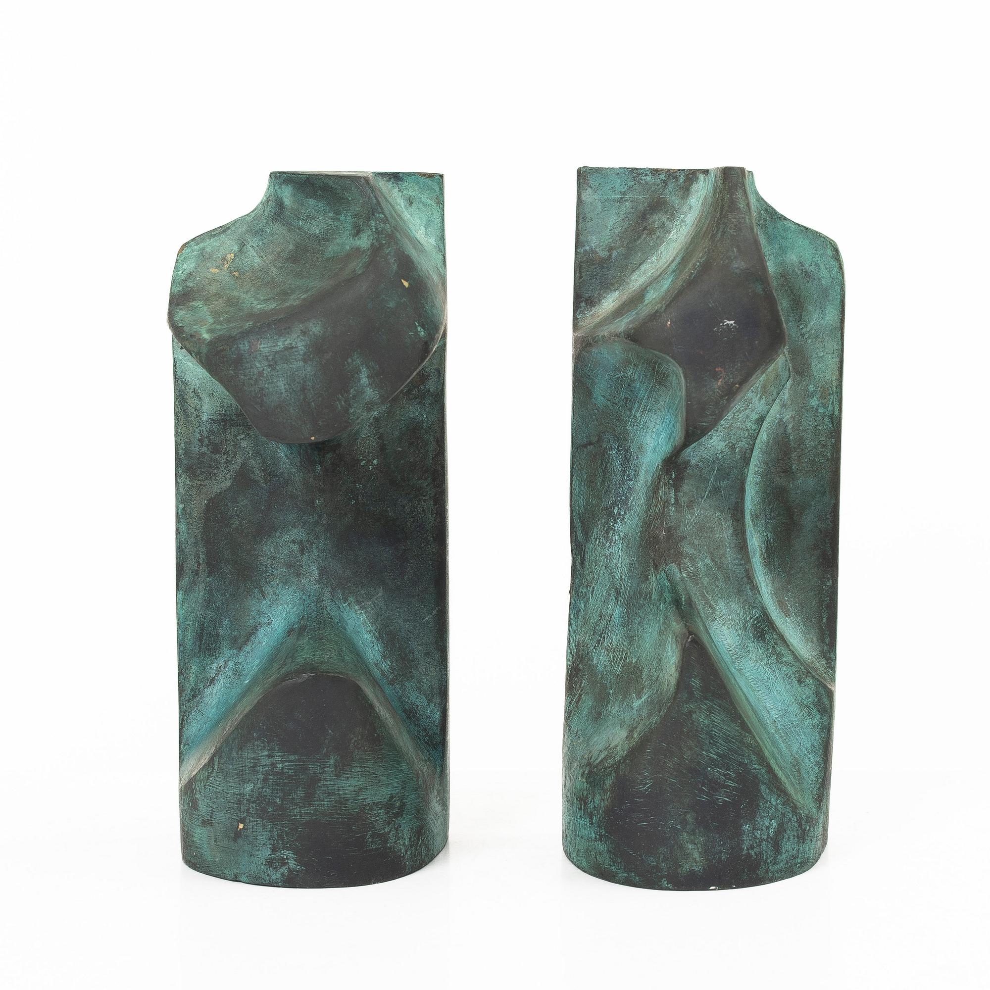 Björn Selder, a pair of green-patinated bronze sculptures/bookends, signed and numbered 4/100.