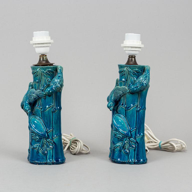 A pair of Chinese blue glazed porcelain table lamps/vases, early 20th century.