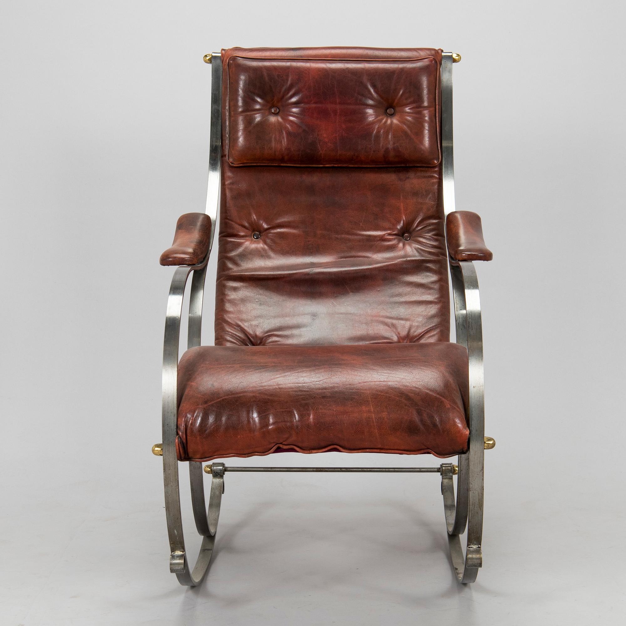 A 20th century steel frame rocking chair.