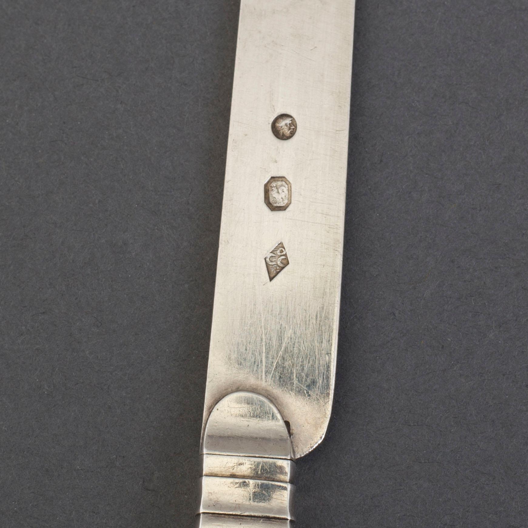 12 French silver and ebony fruit knives, 1809-19.