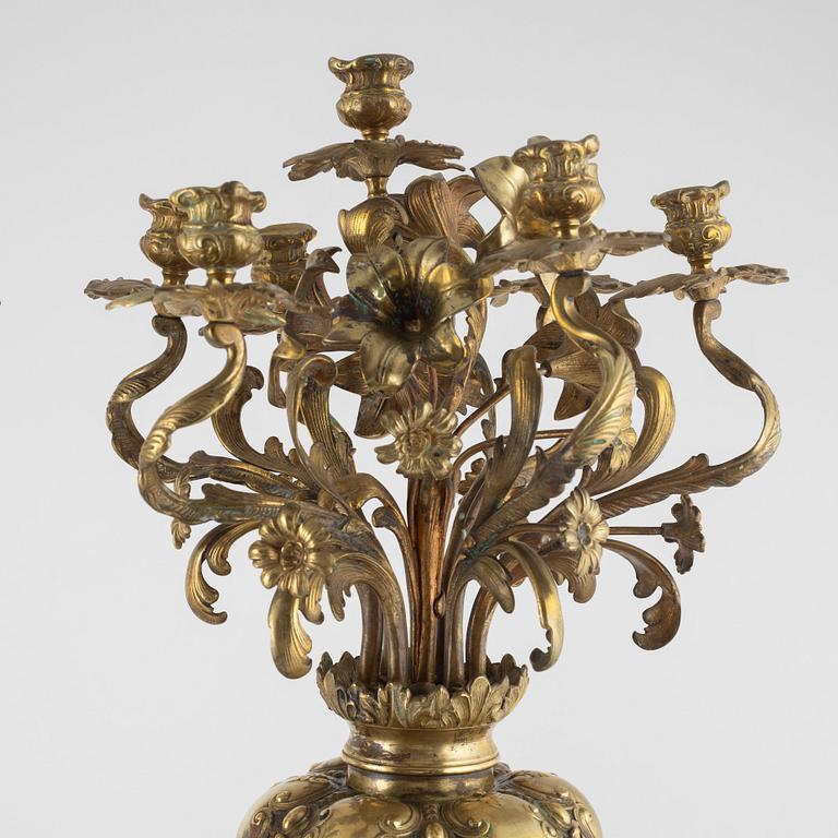 A pair of gilt-brass and satsuma ware seven-light candelabra, the porcelain Meiji period (1868-1912).