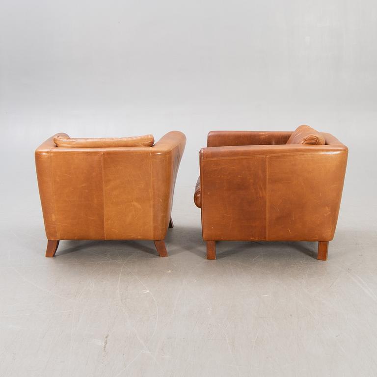 A pair of Lederland leather armchairs Netherlands later part of the 20th century.
