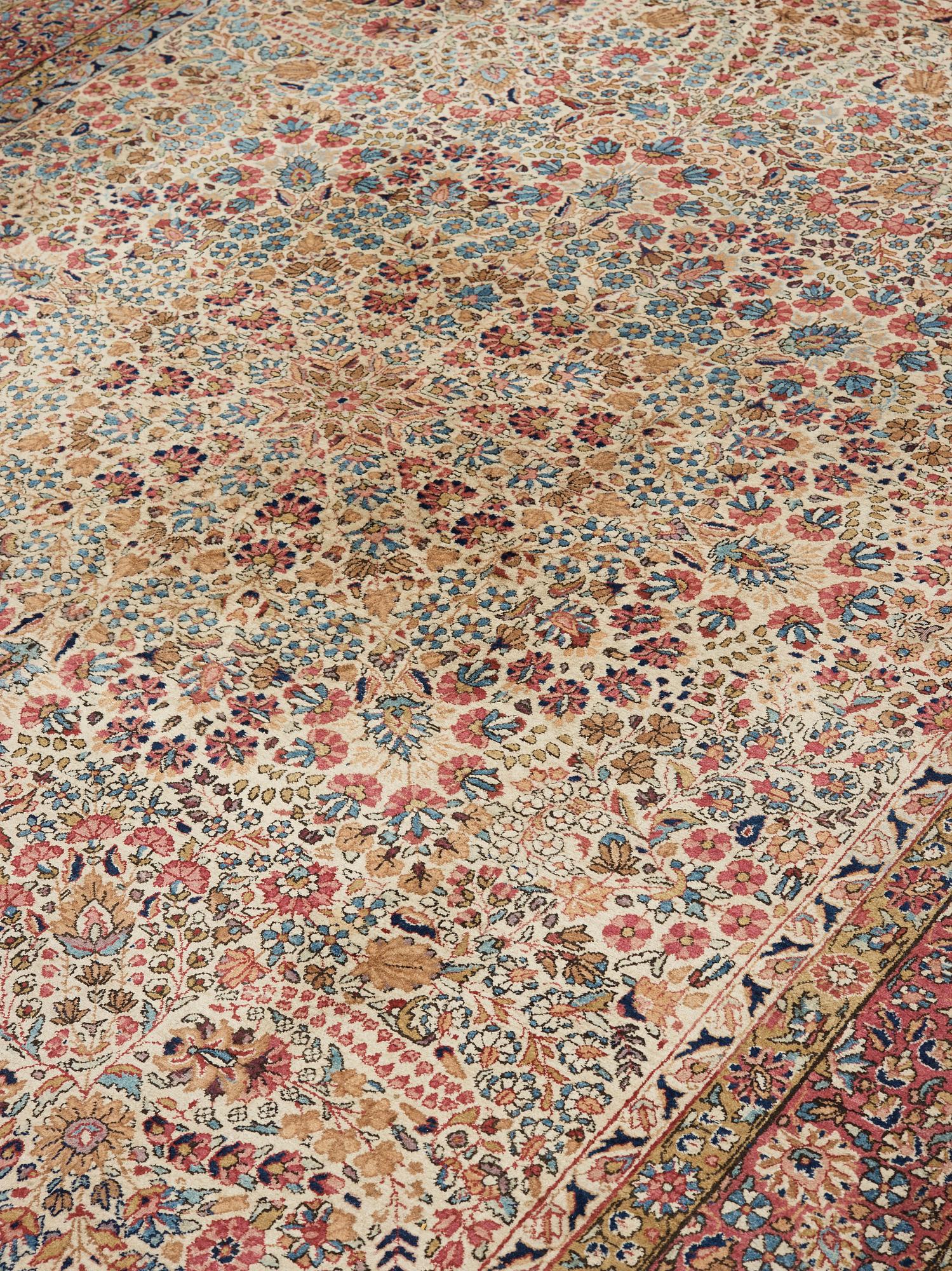 A semi-antique/old Kerman carpet, around 361 x 264 cm.