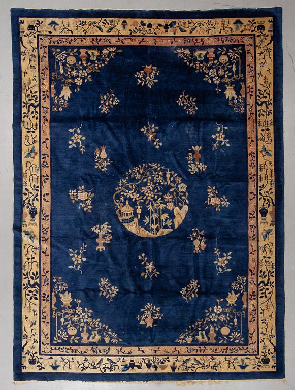 A carpet, a semi-antique/old China, ca 329-333,5 x 239,5-243,5 cm.