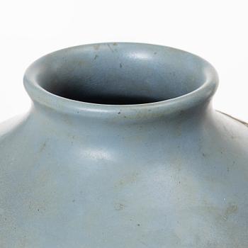 A blue glazed relief vase, possibly Korea, around 1900.