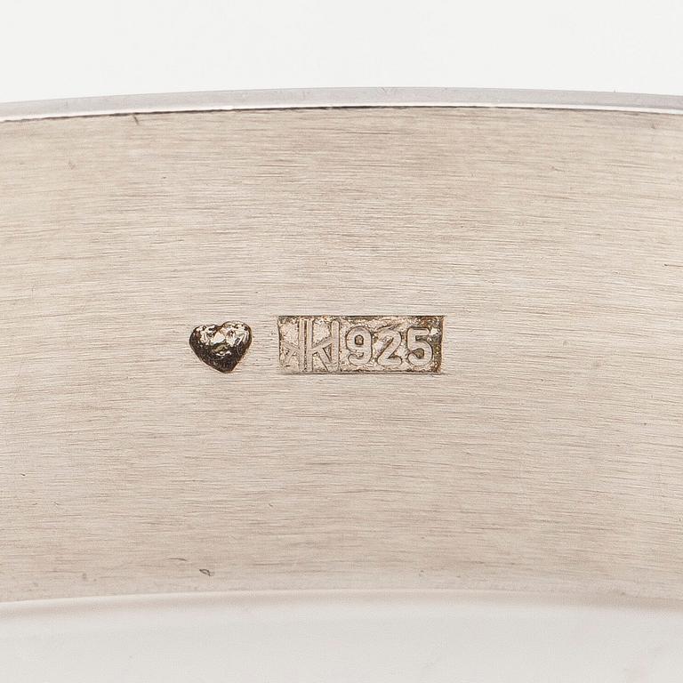 Rannekoru, pyöröhiottu spektroliitti, hopea, Kaunis Koru, 1960-luku.