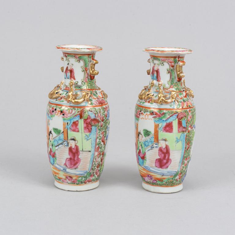 A pair of famille rose Canton table lamps and a pair of vases, late Qing dynasty, 19th Century.