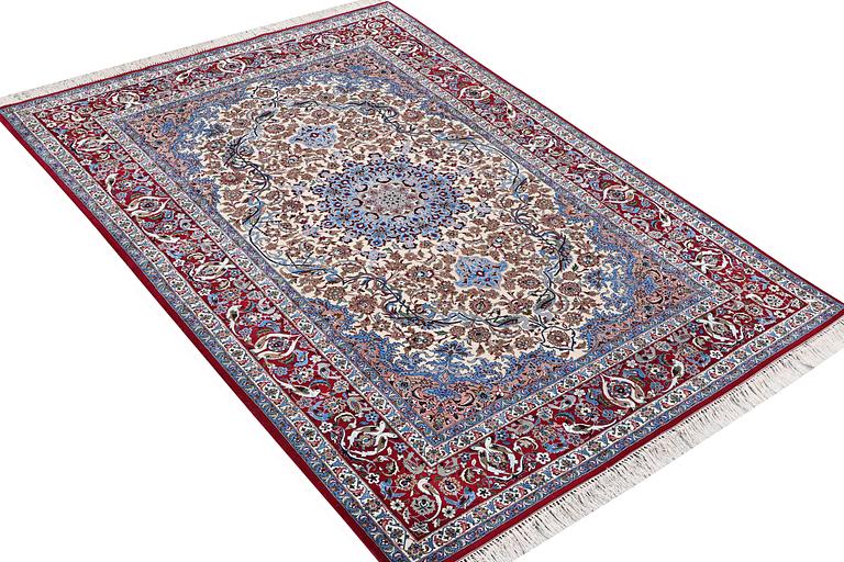 An Isfahan rug, a. 243 x 158 cm.