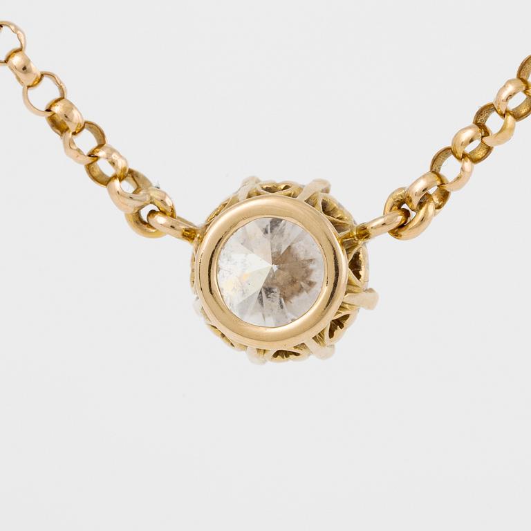 Hängsmycke 18K guld med en rund briljantslipad diamant.