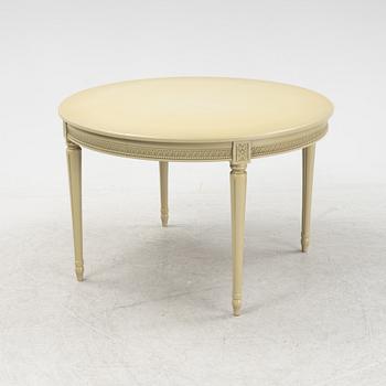 A Gustavian dining table with six chairs. Åmells dated 1974.