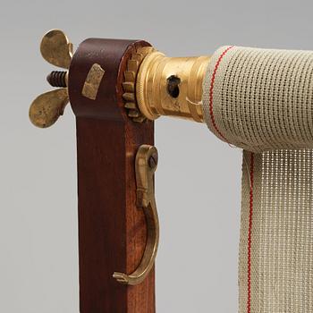 A French Empire early 19th century sewing stand.