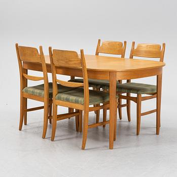 Carl Malmsten, a dining table and four chairs, 'Calmare nyckel', Åfors Möbelfabrik, second half of the 20th century.
