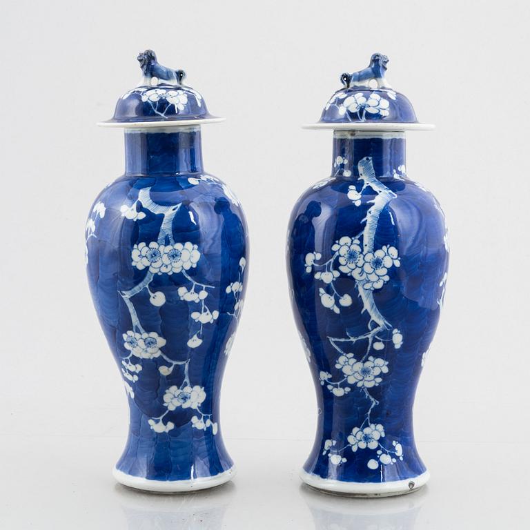 A pair of vases with covers, China, late Qing dynasty.