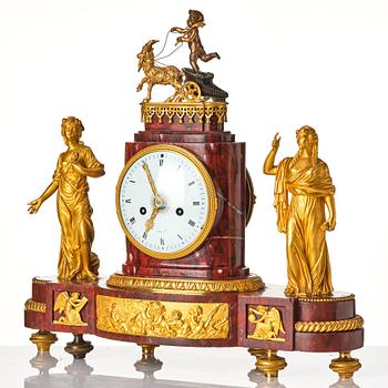 A French Empire 19th century gilt bronze mantel clock signed Lamiral.