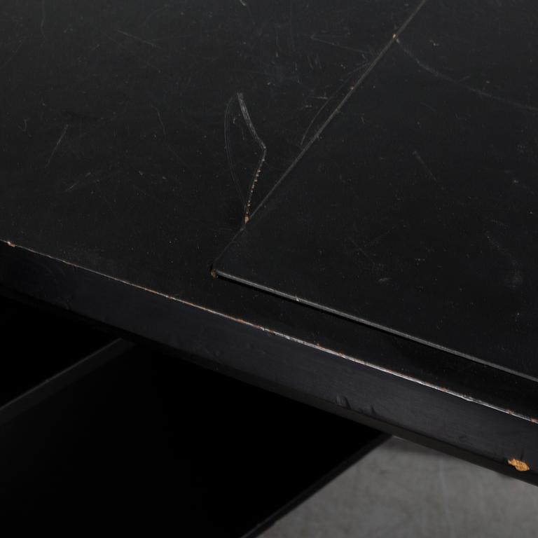 A "Teclino" desk by Osvaldo Borsani for Tecno, Italy.