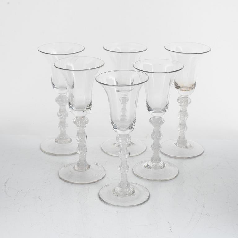 A set of eight wine glasses (6+2), England, 18th / 19th Century.