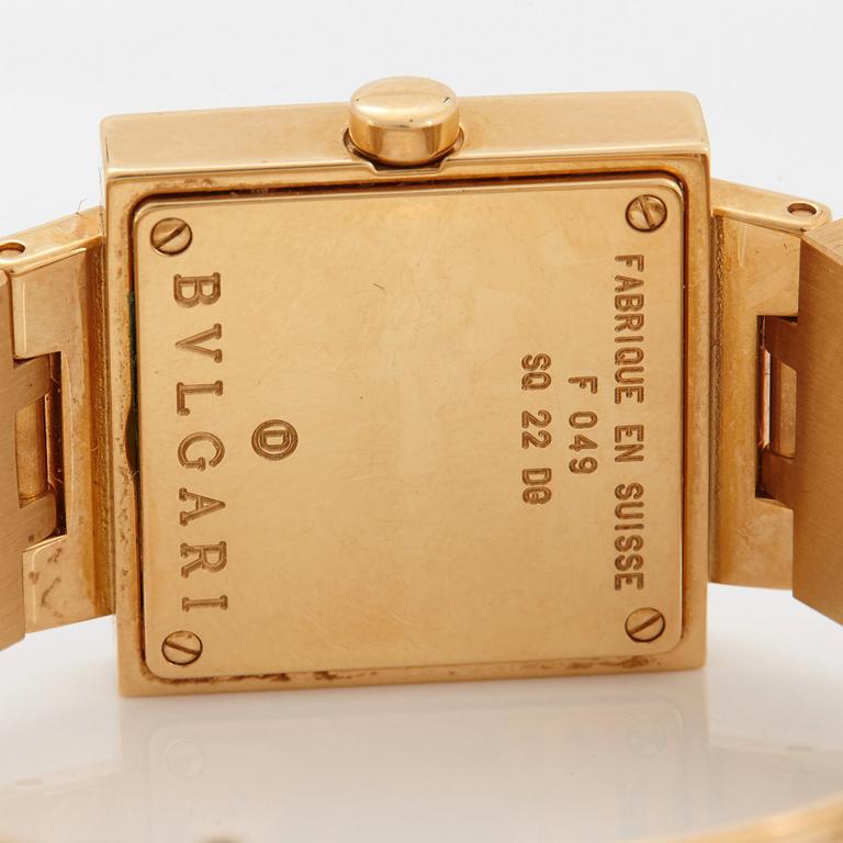 Bulgari damarmbandsur 18K guld med trappslipade rubiner och runda briljantslipade diamanter.