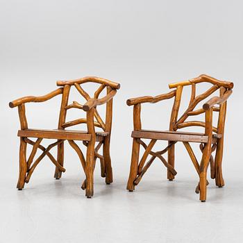 A pair of chairs, mid 20th Century.