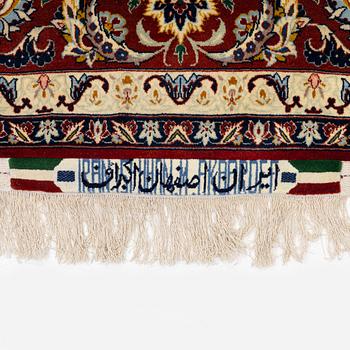 An Isfahan carpet, Central Persia, signed Akbaroff, c. 315 x 205 cm.
