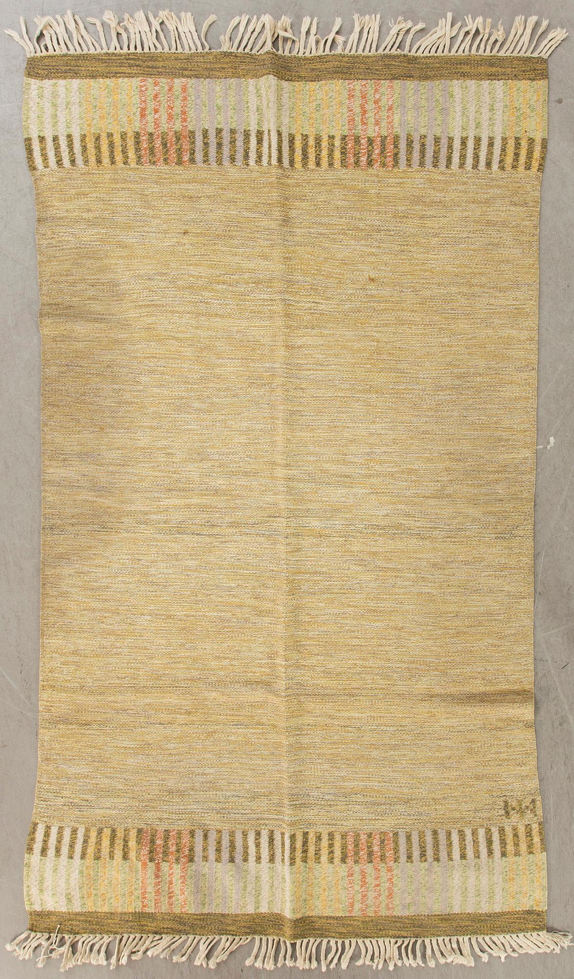 A Scandinanvian flat weave carpet ca 242 x 120 cm.