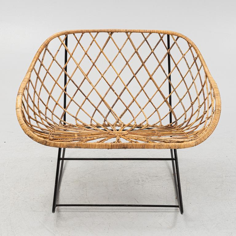 A rattan rocking chair.