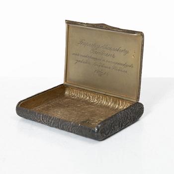 A Russian silver samorodok cigarette case, St. Petersburg 1908-17, unidentified maker's mark, possibly Ivan Arkarov.