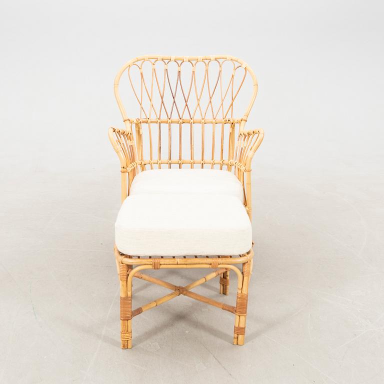 Josef Frank, wicker chair with stool model no. B 311 for Svenskt Tenn, second half of the 20th century.