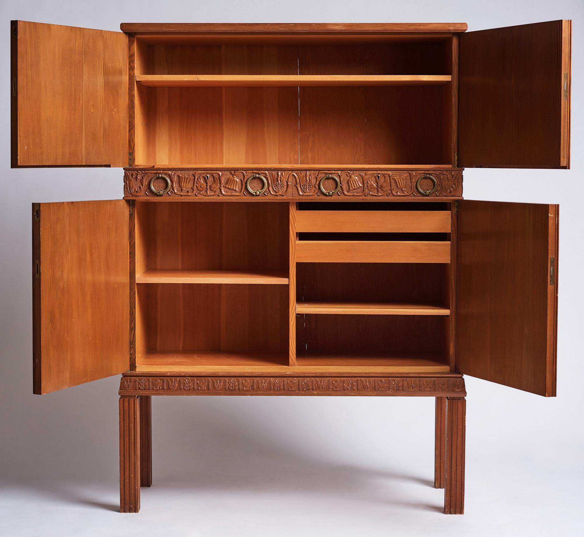 A Swedish Modern stained pine cabinet, 1940s.