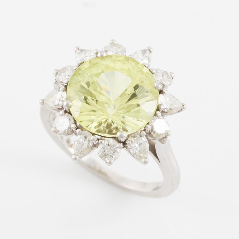 Ring, in the form of a flower, platinum with chrysoberyl and drop-cut and brilliant-cut diamonds.