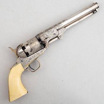 A percussion revolver, Colt 1851 Navy, in case, from the year 1863.