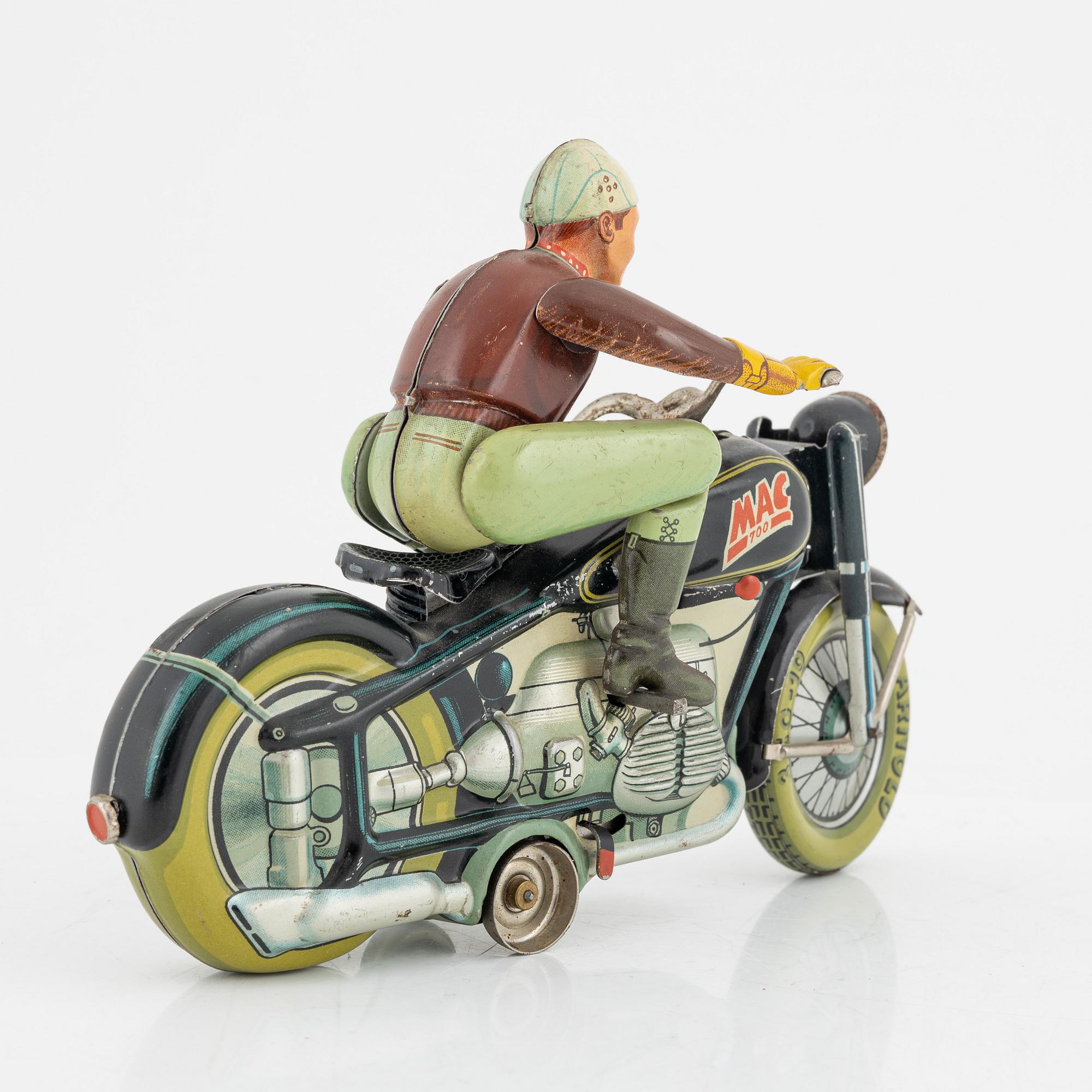 A tin motorcycle, 'Mac 700' from Arnold, Germany, around mid 20th Century.
