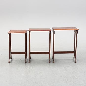 A three piece nesting table with inlay, first half of the 20th Century.