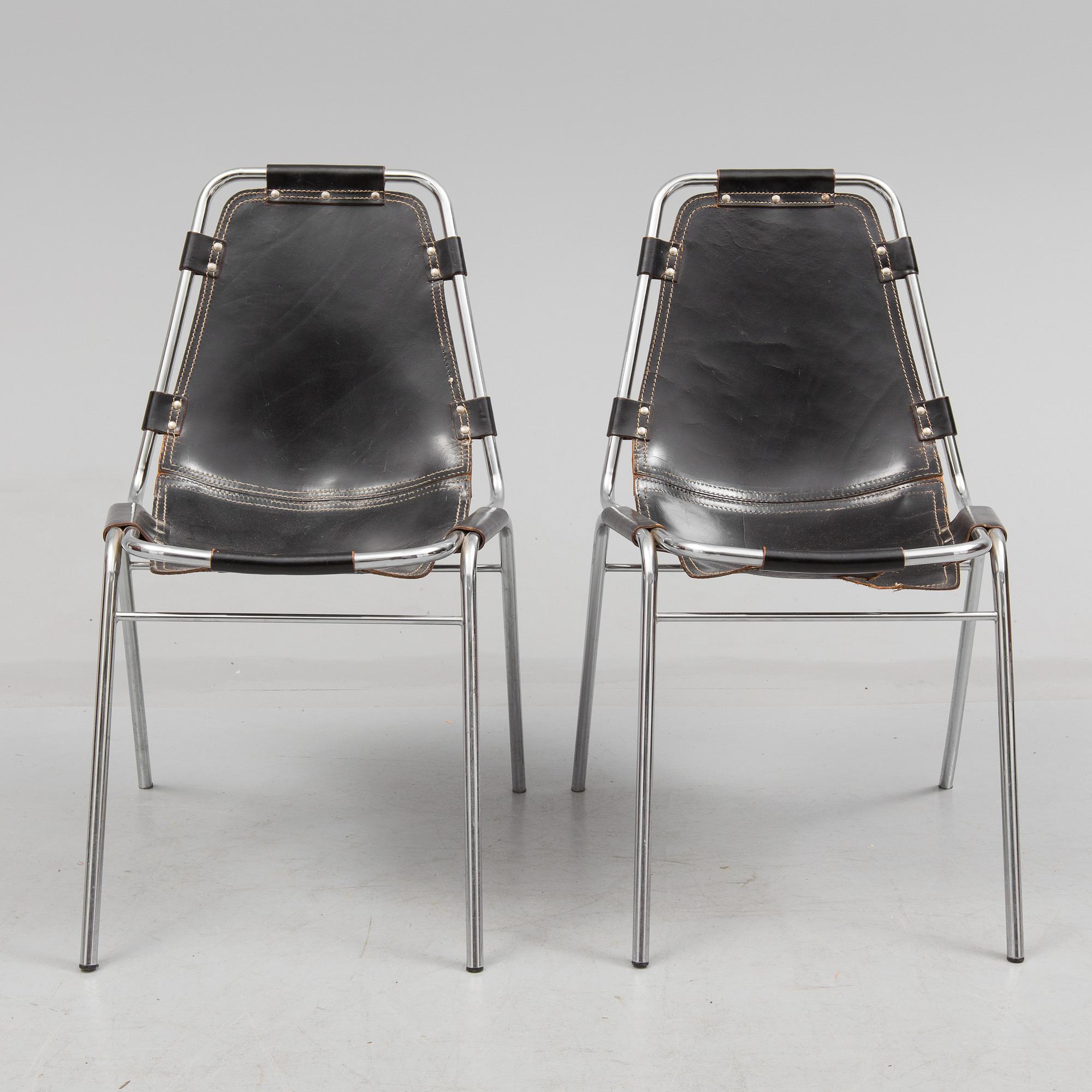 CHARLOTTE PERRIAND, a pair of "Les Arcs" chairs from the 1970's.