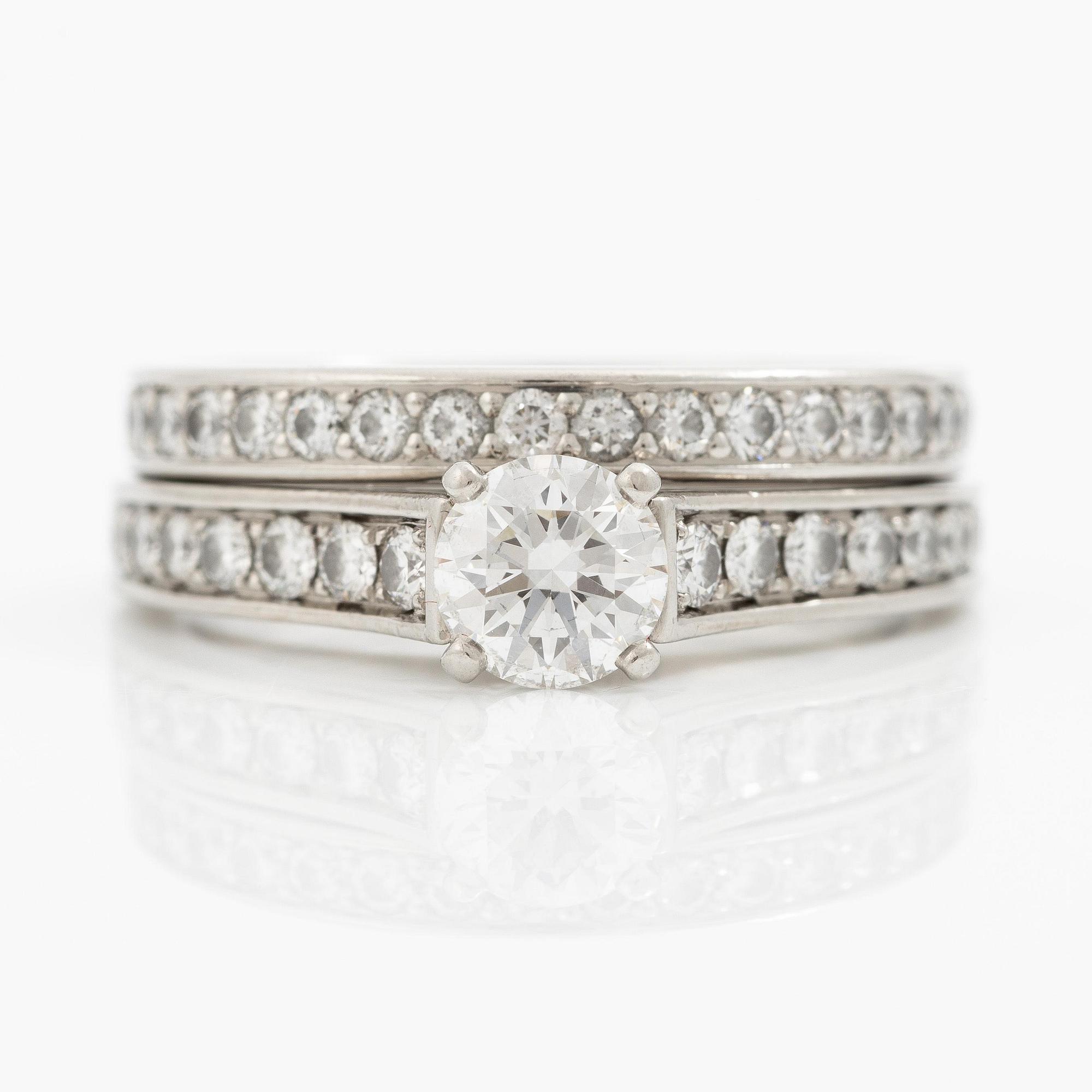 Cartier two rings platinum with round brilliant-cut diamonds.