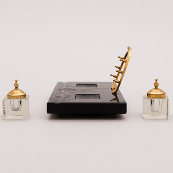 A late 19th Century Desk Set, 6 pcs in brass and stone, incl ink stand and a pair of candle sticks.