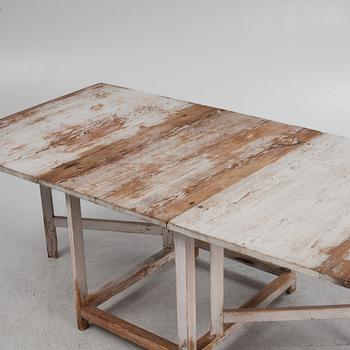 A painted gate leg table, 19th Century.